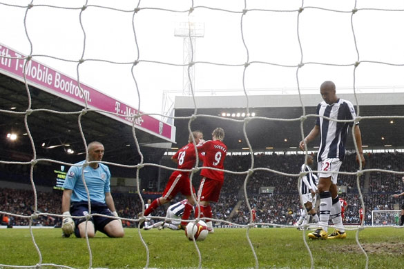 Relegation timescale: Dirk Kuyt celebrates after scoring Liverpool's second goal 