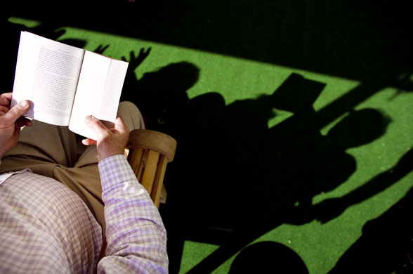Hay Festival 2009: A festival goer reading a book during The Guardian Hay festival 2009