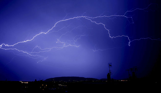 24 hours: San Sebastian, Spain: Lightning is seen  during a storm