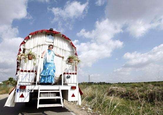 26 May 2009: Coria del Rio, Spain: A pilgrim from the Malaga brotherhood