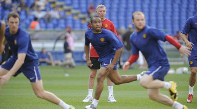 Training Sessions: Alex Ferguson watches Evans, Anderson and Rooney