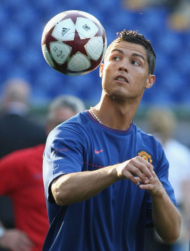 Training Sessions: Cristiano Ronaldo keeps watches the ball whilst doing a bit of keepie uppie