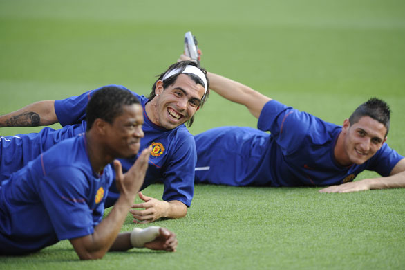 Training Sessions: Tevez and Macheda laugh at Evra