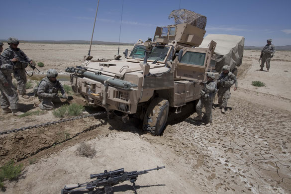 Sean Smith Afghanistan: American Army troops free an MRAP vehicle after it became stuck