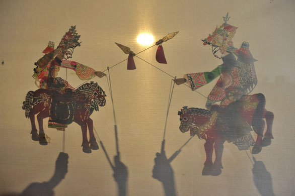 24 hours in pictures: Shadow puppetry practice at elementary school in Shenyan China