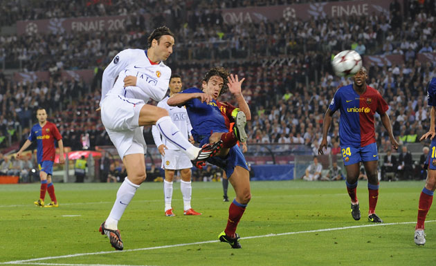 Footballers: Berbatov fires chance over.