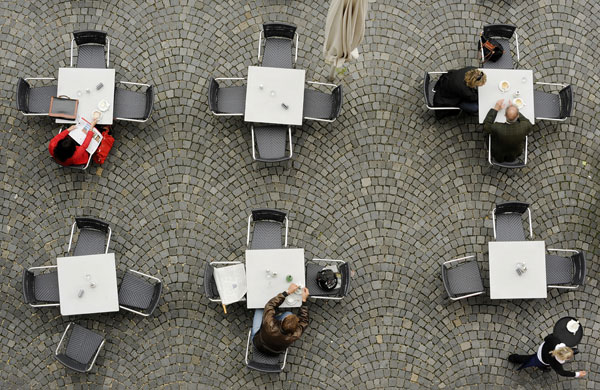28 May 2009: Munich, Germany: Guests sit on the terrace of the Literaturhaus Cafe