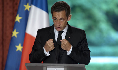 France's President Sarkozy delivers a speech at the Elysee Palace