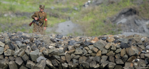 North Korea Border: A North Korean soldier looks towards China