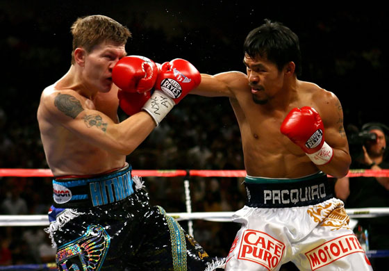 Hatton and Pacquiao: Manny Pacquiao connects with a right to the face of Ricky Hatton