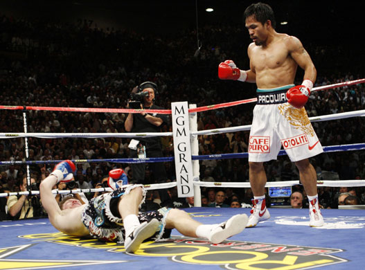 Hatton and Pacquiao: Ricky Hatton goes down in a TKO in the second round