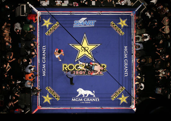 Hatton and Pacquiao: Ricky Hatton lies flat on his back after the was knocked down by Pacquiao