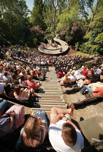 British sunshine: A matinee audience watch a production of Much Ado About Nothing