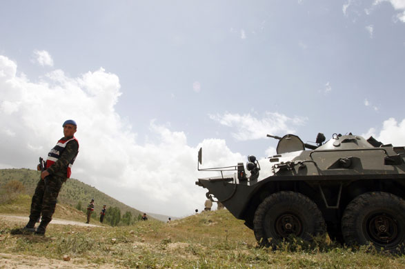 Attack in Turkey: A soldier stands guard at the entrance to Bilge village