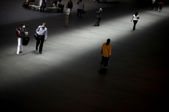 24 hours in pictures : Passengers at the international airport in Mexico City