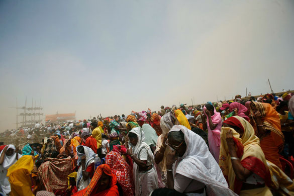 Gandhi election campaign: 24 April, Purulia: People wait to hear Rahul Gandhi speak at the rally