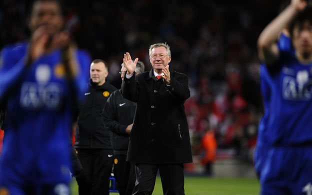 Arsenal united: Alex Ferguson smiles and applauds