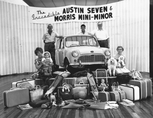 50 Years of the Mini Austin Seven Morris MiniMinor car on a podium