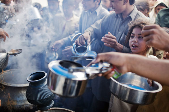 24 hours in pictures: refugees flee fighting in north west frontier province in pakistan