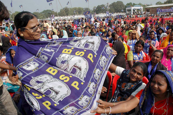 BSP Mayawati Kumari Rally: BSP workers display a sari with their party symbol on it