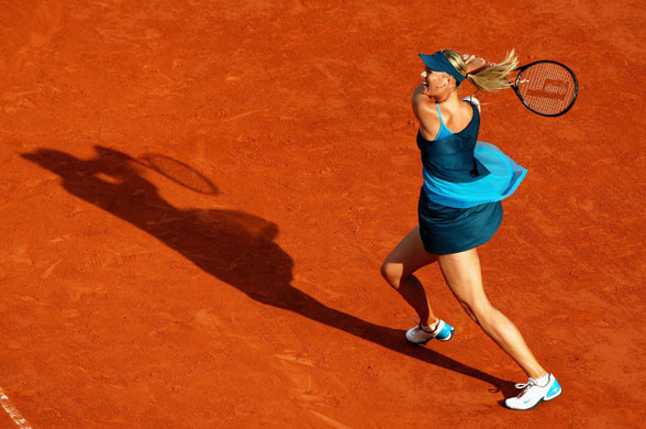 24sport: Maria Sharapova of Russia hits a backhand