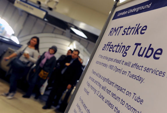 London underground strike: Commuters make their way home before the Tube strike in London