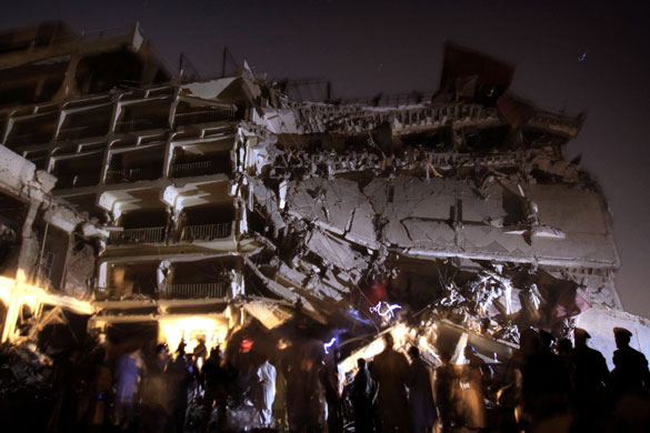 Peshawar bombing: Partially collapsed hotel after an explosion in Peshawar