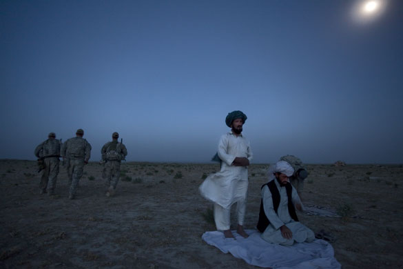 Sean Smith in Afghanistan: American soldiers with village elders praying