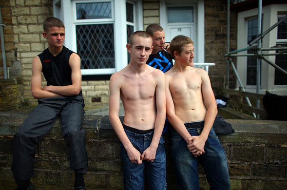 24 hours: Burnley, England: Youths enjoy the sunshine 