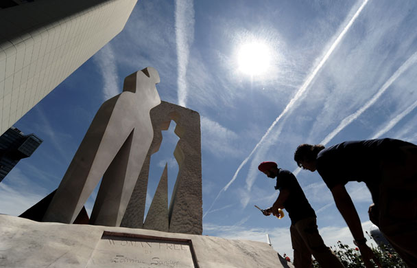 24 hours: Vienna, Austria: Maintenance workers stand by the 