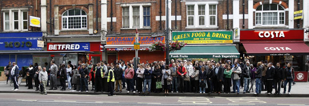 Tube strike: Shepherds Bush: Commuters queue for buses