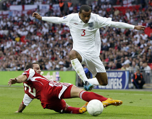 england andorra: England's Cole jumps over Josep Manuel Ayala 