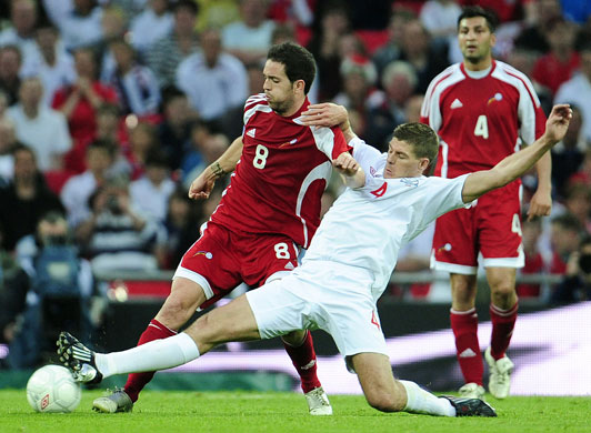 england andorra: Steven Gerrard and Marcio Vieira fight for the ball