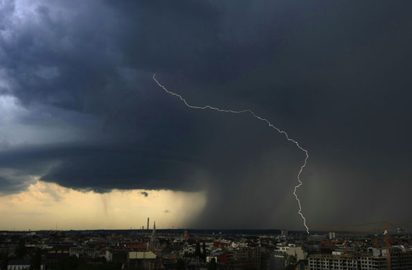 24 hours: Lightening strikes the ground during a thunderstorm in Budapest