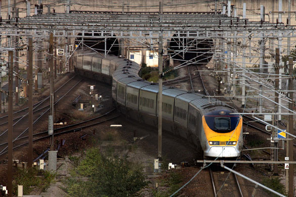 Week in Business: A Eurostar train leaves the northbound Channel tunnel to England in Calais