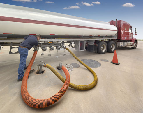 megatrucks: Tank truck filling underground tanks at gas station
