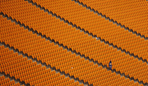 12 June 2009: Soweto, South Africa: A worker at the Soccer City stadium