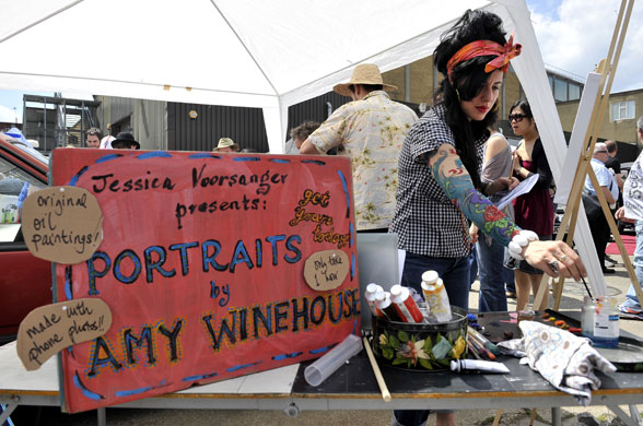 Art Car Boot Fair: Artist Jessica Voorsanger on her stand dressed as Amy Winehouse