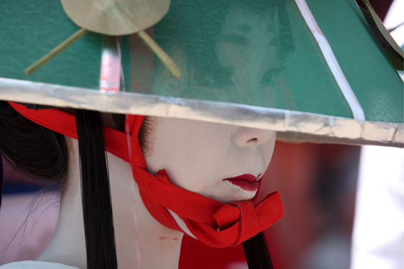 15 June 2009: Osaka, Japan: A woman dressed in the clothing of the Heian Period