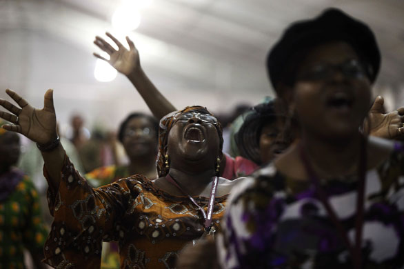 24 hours in pictures: Members of the Redeemed Christian Church of God worship in Floyd, Texas