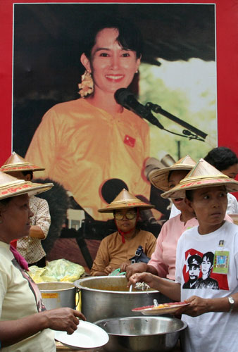 Aung San Suu Kyi 64th: Supporters of Aung San Suu Kyi celebrate her 64th birthday in Yangon