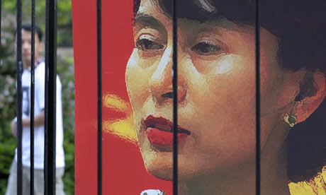 A poster of Aung San Suu Kyi in a cage as Japanese supporters held a