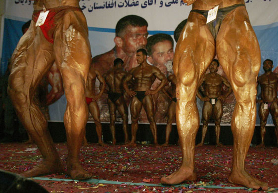 24 hours in pictures: Afghan men strike a pose during national bodybuilding competition Kabul