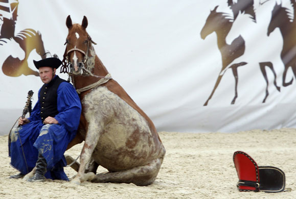 24 hours in pictures: A traditional Hungarian horseman performs in Budapest