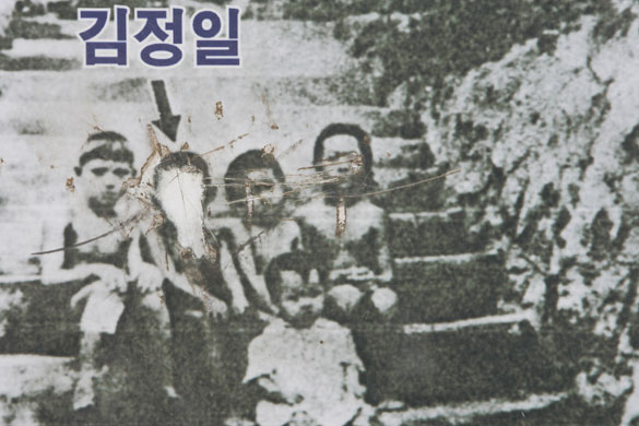 Jong Il family: Kim Jong Il, second from left, Korean friends and a Soviet playmate