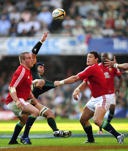 lions 1st test: Gethin Jenkins, left, and team mate David Wallace tackle Pierre Spies 