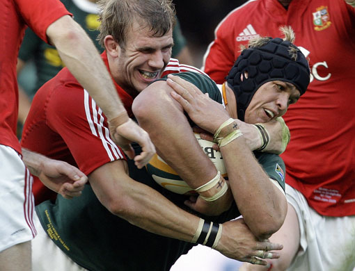 lions 1st test: Juan Smith is tackled by Tom Croft 