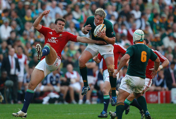 lions 1st test: Lions centre Jamie Roberts is beaten to the ball by Jean de Villiers 