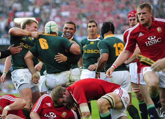 lions 1st test: South Africa's Heinrich Brussow is congratulated by team mates 