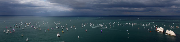 Round the Island: As the sky darkens, the fleet round The Needles